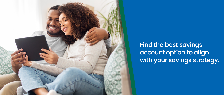 Find the best savings account option to align with your savings strategy - man and woman looking at a laptop
